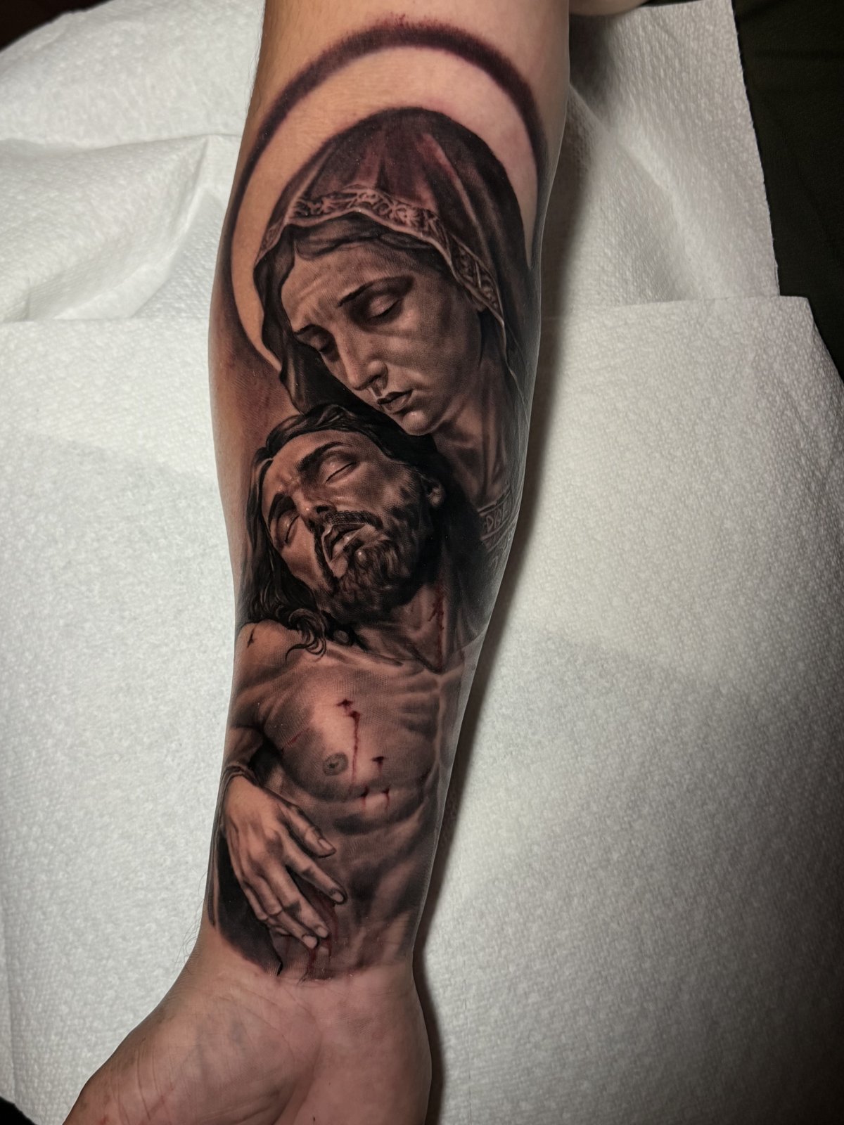 Tattoo work by Alejandro Campos — Pietà forearm piece
